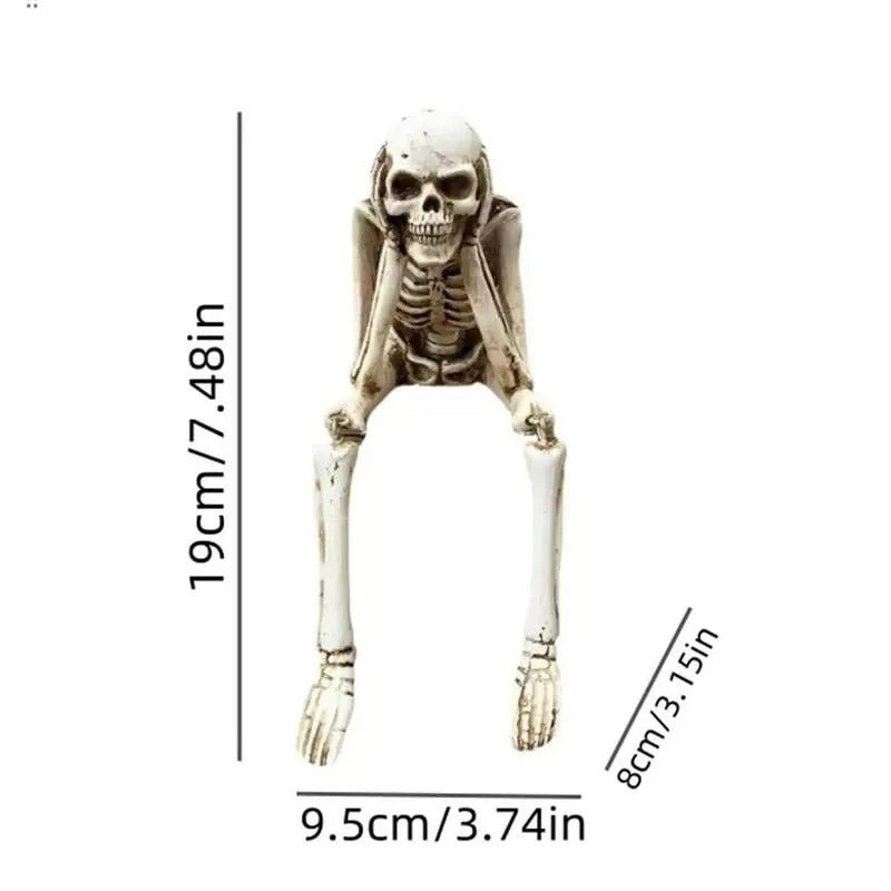 Drie wijze skeletten — openhaarddecoratie voor Halloween