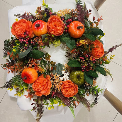 Herfstkrans met bloemen en pompoen — verwarmt het hart en verwelkomt gasten