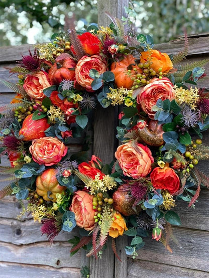 Herfstkrans met bloemen en pompoen — verwarmt het hart en verwelkomt gasten