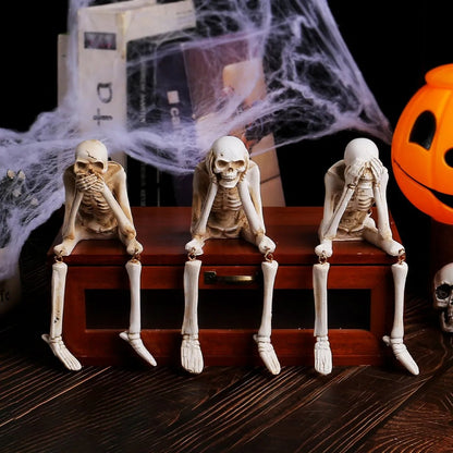 Drie wijze skeletten — openhaarddecoratie voor Halloween