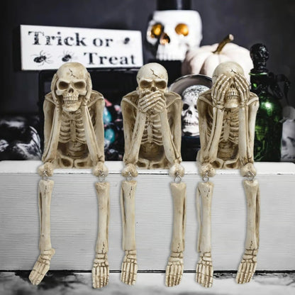 Drie wijze skeletten — openhaarddecoratie voor Halloween