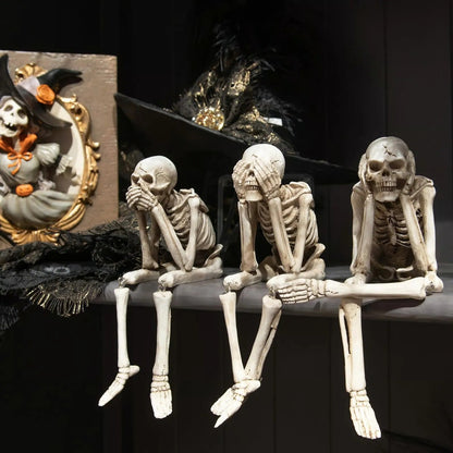 Drie wijze skeletten — openhaarddecoratie voor Halloween