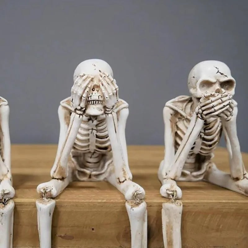 Drie wijze skeletten — openhaarddecoratie voor Halloween