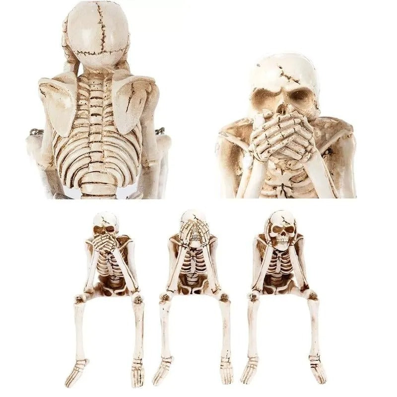 Drie wijze skeletten — openhaarddecoratie voor Halloween