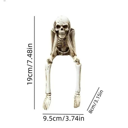 Drie wijze skeletten — openhaarddecoratie voor Halloween